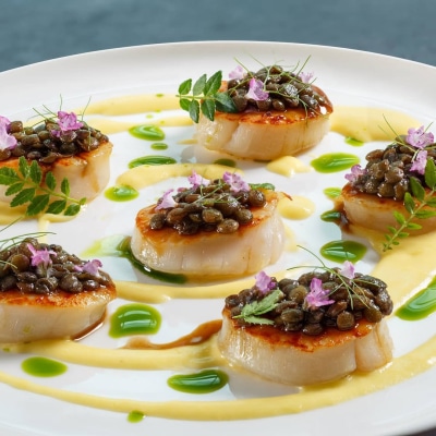 Pan-Seared Hokkaido Scallops with Corn Cream, Beluga Lentils & Dill Oil